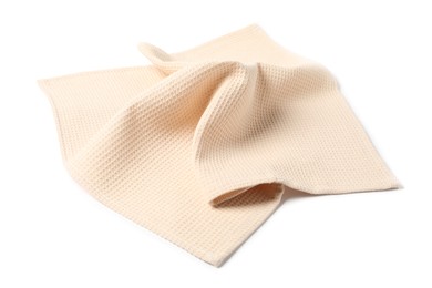 Photo of Clean beige waffle towel isolated on white