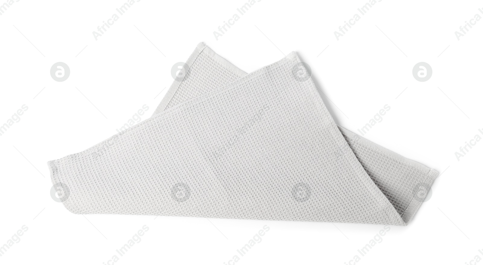 Clean light grey waffle towel isolated on white Photo of Clean light grey waffle towel isolated on white