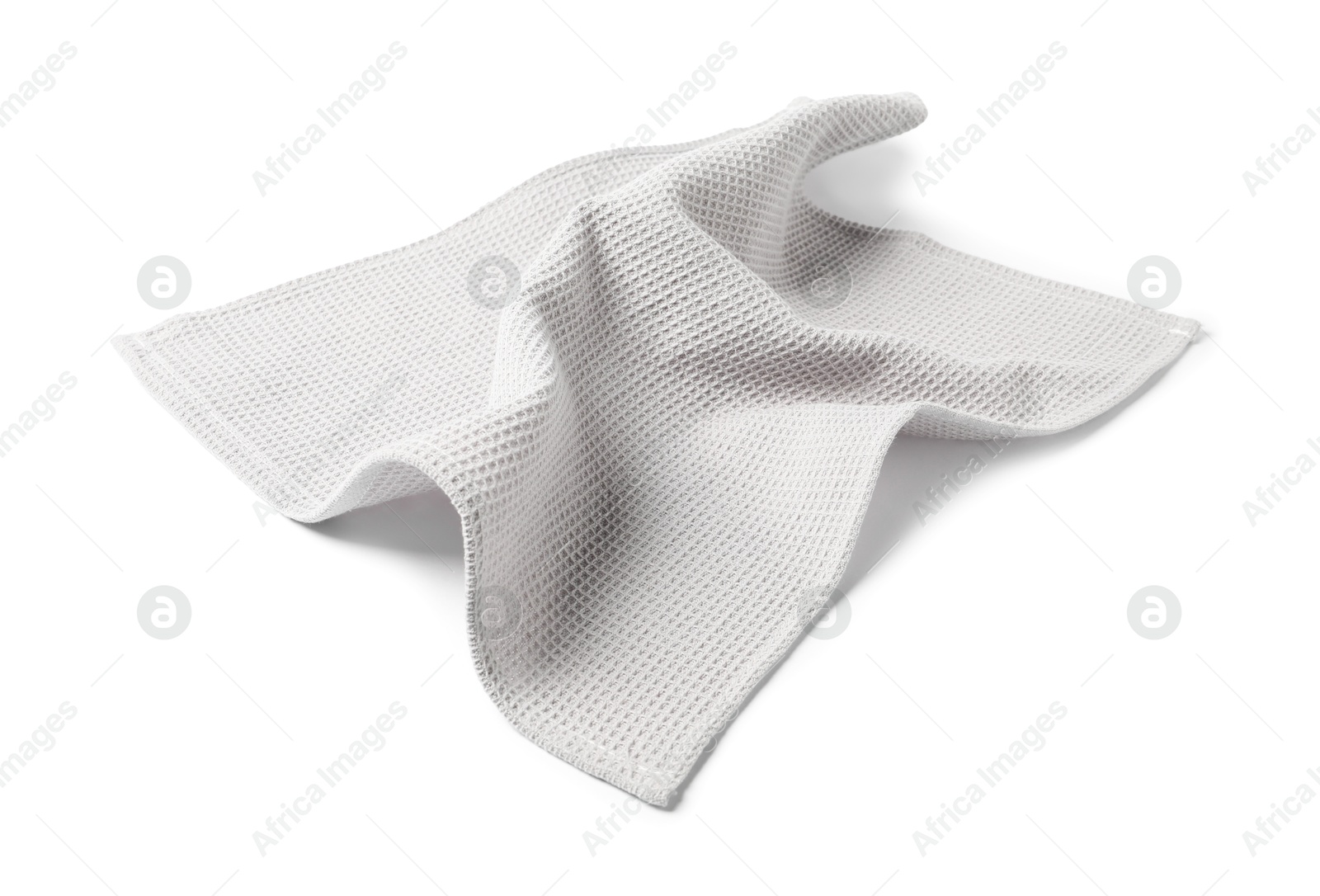 Clean light grey waffle towel isolated on white Photo of Clean light grey waffle towel isolated on white