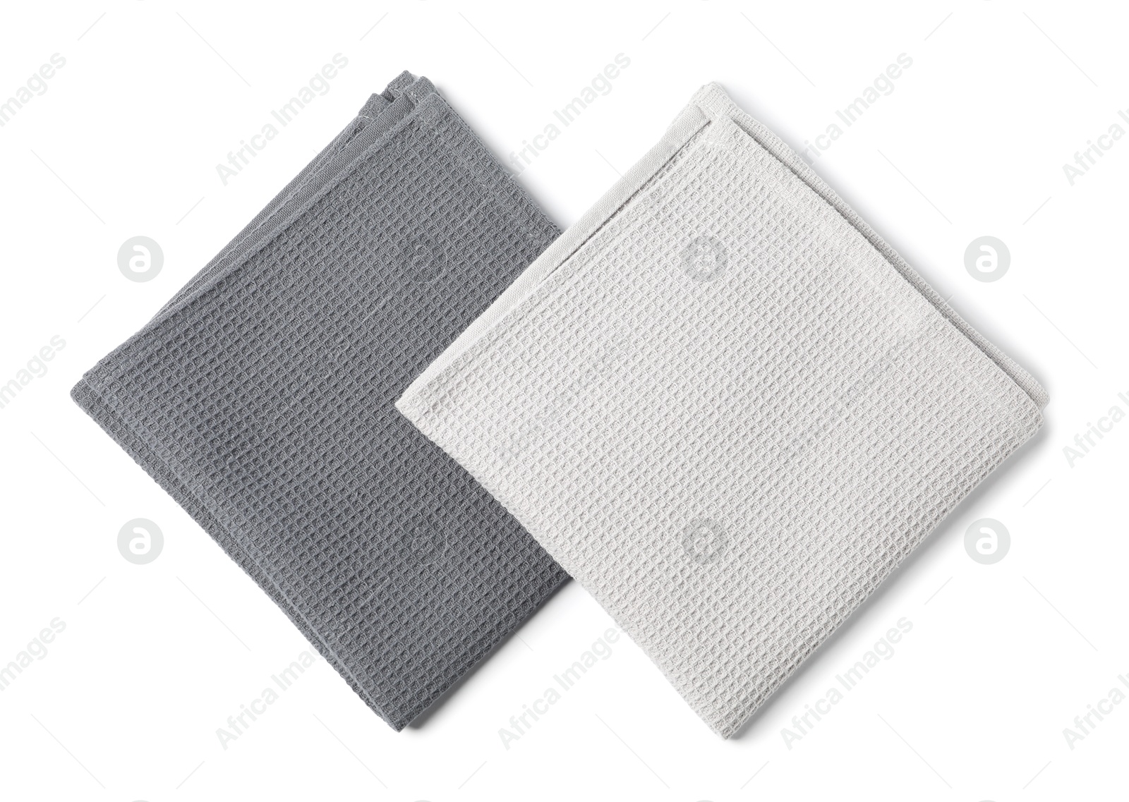 Two clean waffle towels isolated on white, top view Photo of Two clean waffle towels isolated on white, top view