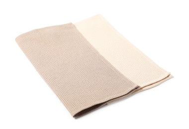 Photo of Two clean waffle towels isolated on white