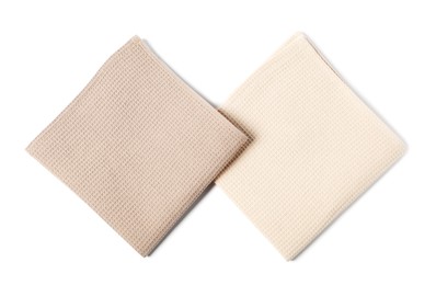 Photo of Two clean waffle towels isolated on white, top view