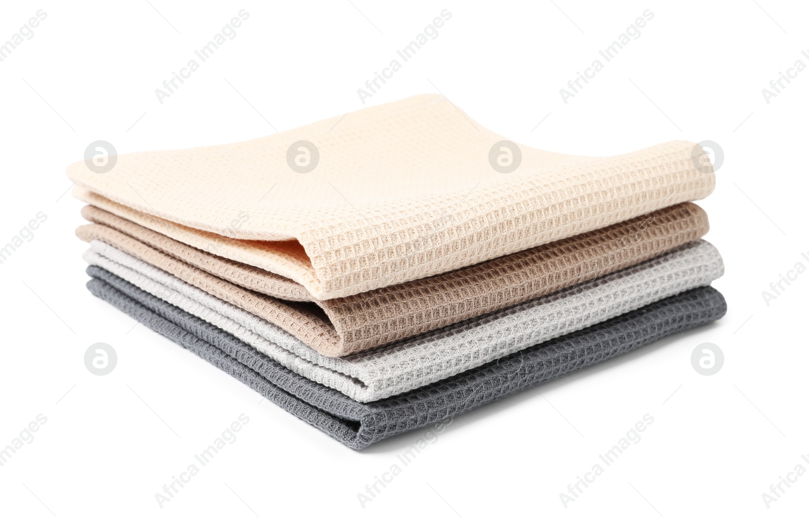 Many clean waffle towels isolated on white Photo of Many clean waffle towels isolated on white