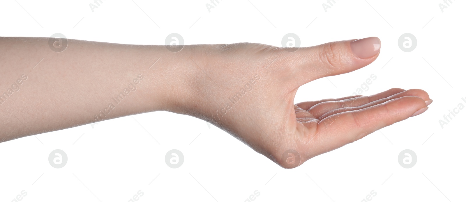 Woman holding something in hand on white background, closeup Photo of Woman holding something in hand on white background, closeup