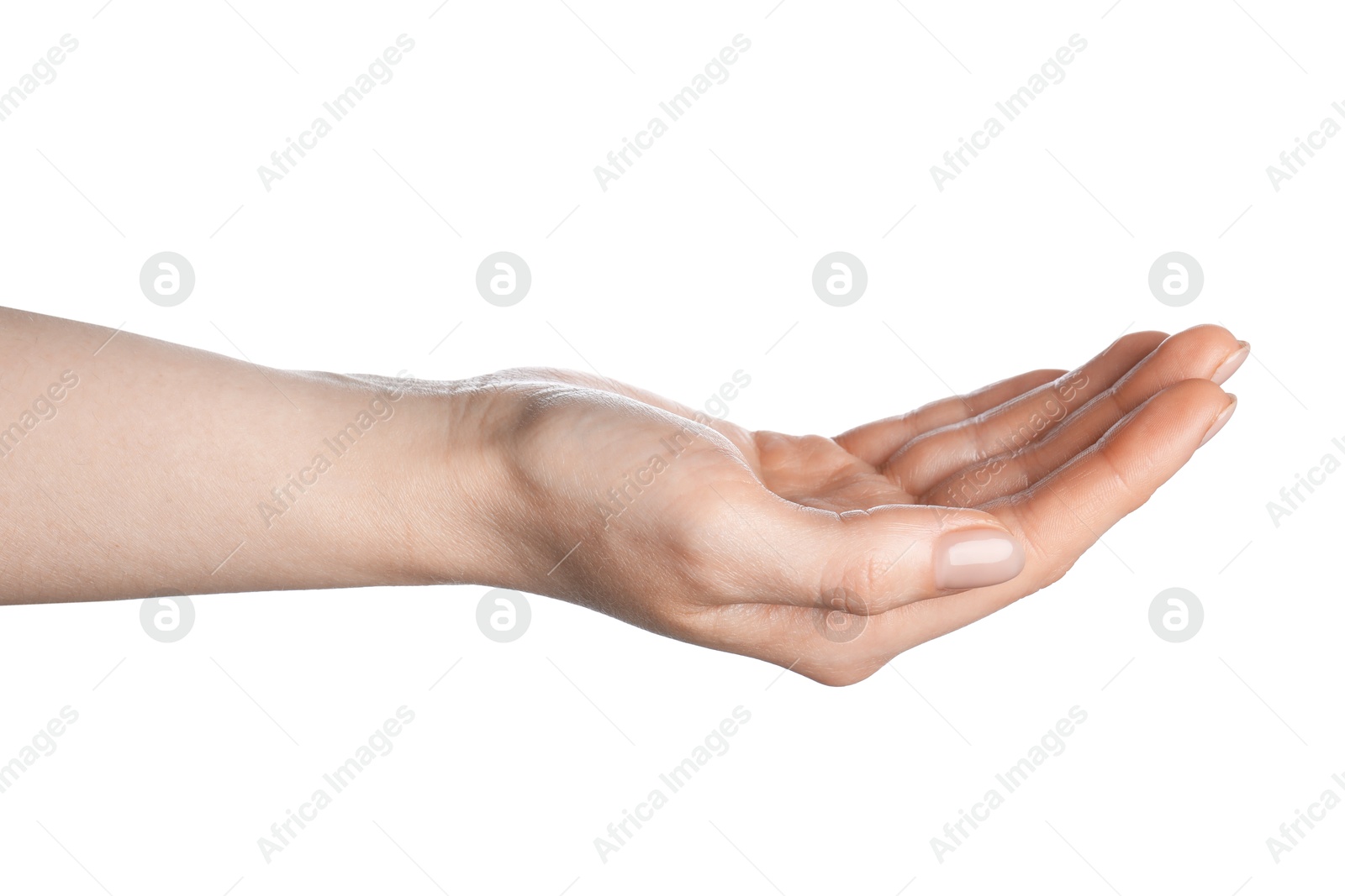 Woman holding something in hand on white background, closeup Photo of Woman holding something in hand on white background, closeup