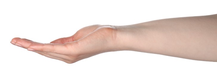 Photo of Woman holding something in hand on white background, closeup
