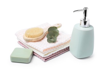 Photo of Clean waffle towels and cosmetic products isolated on white