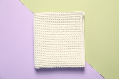 Photo of Clean waffle towel on color background, top view