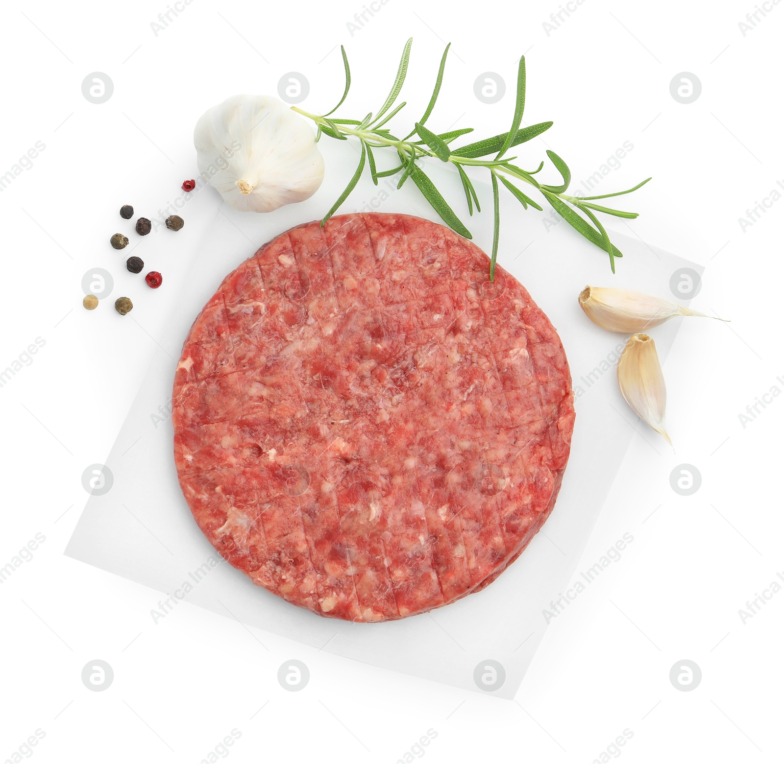 Fresh raw patty for burger and spices isolated on white, top view Photo of Fresh raw patty for burger and spices isolated on white, top view
