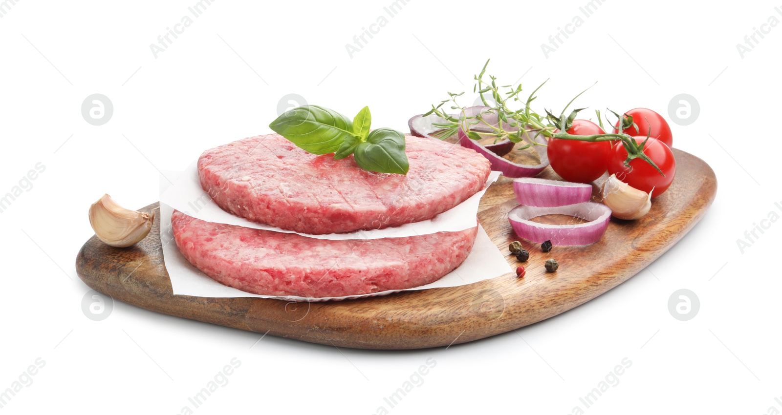 Fresh raw patties for burger, tomatoes and spices isolated on white Photo of Fresh raw patties for burger, tomatoes and spices isolated on white
