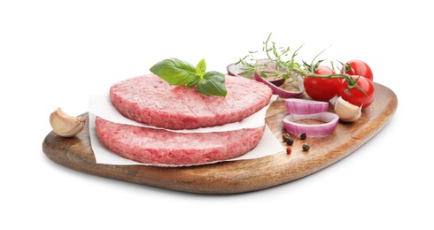 Photo of Fresh raw patties for burger, tomatoes and spices isolated on white