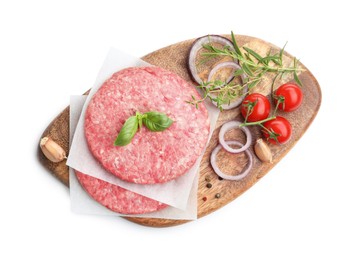 Photo of Fresh raw patties for burger, tomatoes and spices isolated on white, top view