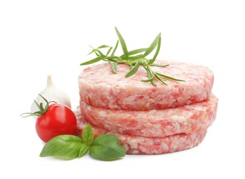 Photo of Fresh raw patties for burger, tomato and spices isolated on white