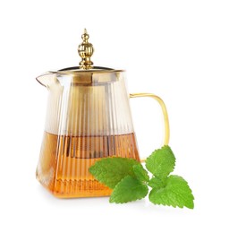 Photo of Aromatic lemon balm tea in glass teapot and fresh leaves isolated on white