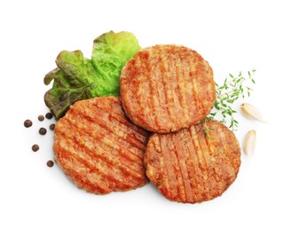 Photo of Delicious hamburger patties and spices isolated on white, top view