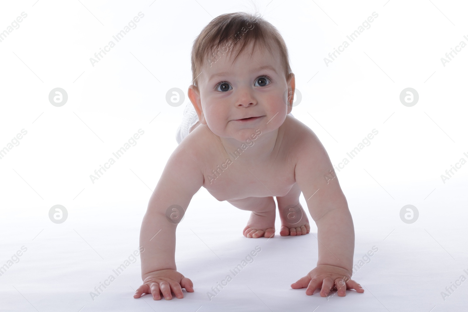 Cute little baby crawling on white background Photo of Cute little baby crawling on white background