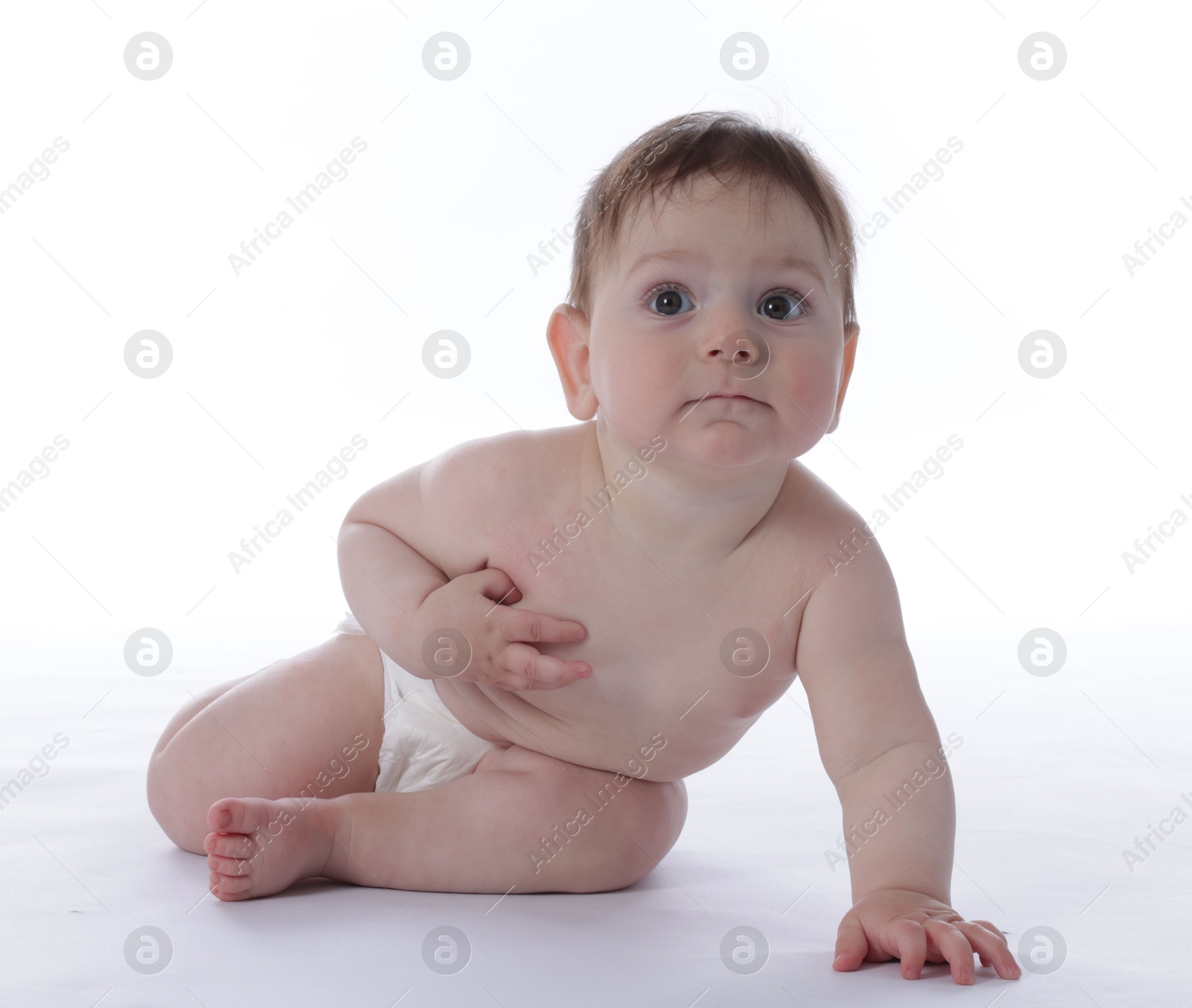 Cute little baby crawling on white background Photo of Cute little baby crawling on white background