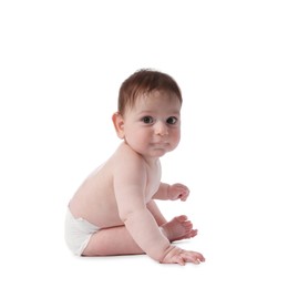 Photo of Cute little baby in diaper sitting on white background