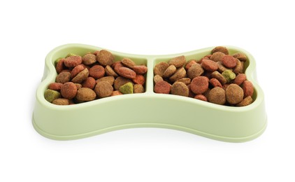 Photo of Dry pet food in feeding bowl isolated on white