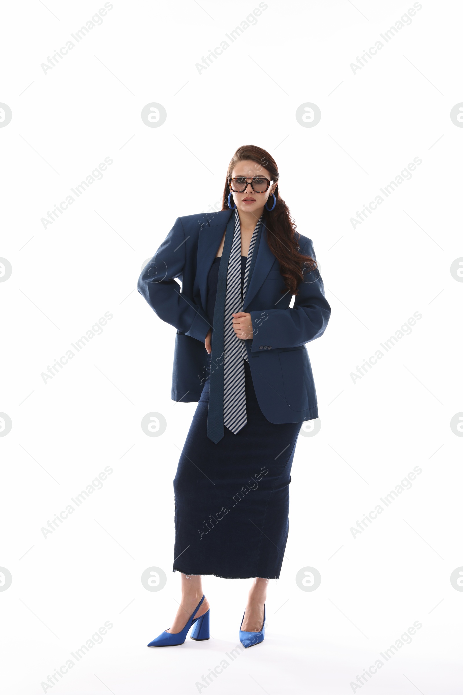 Young woman in stylish clothes on white background Photo of Young woman in stylish clothes on white background