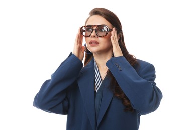 Photo of Young woman in stylish clothes on white background