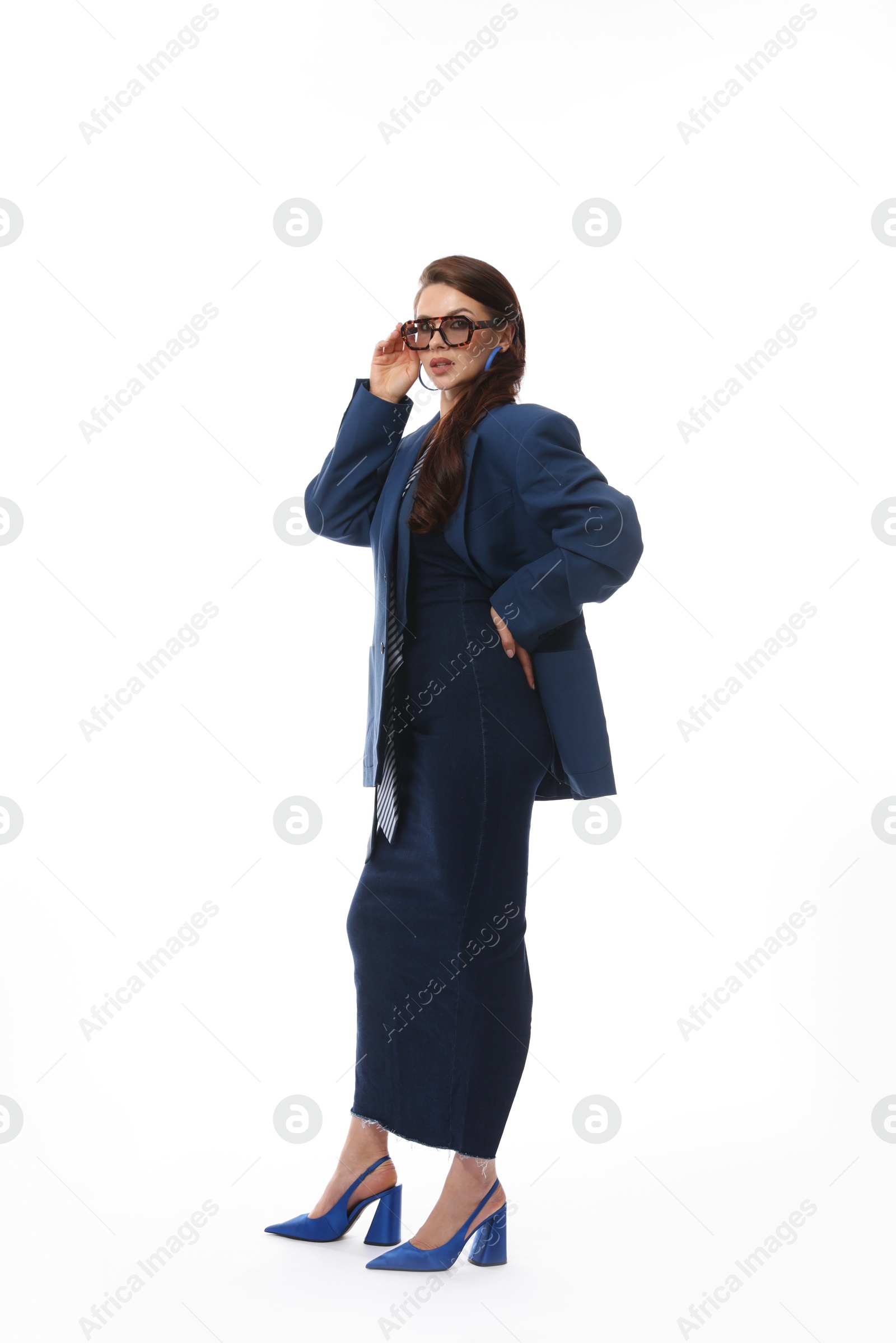 Young woman in stylish clothes on white background Photo of Young woman in stylish clothes on white background