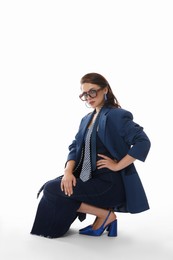 Photo of Young woman in stylish clothes on white background