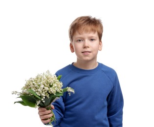Photo of Boy with bouquet of beautiful lily-of-the-valley flowers on white background