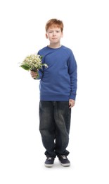 Photo of Boy with bouquet of beautiful lily-of-the-valley flowers on white background