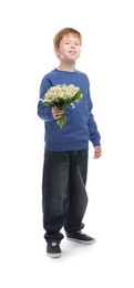 Photo of Boy with bouquet of beautiful lily-of-the-valley flowers on white background