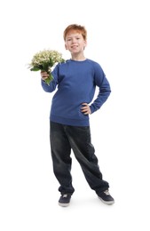 Photo of Boy with bouquet of beautiful lily-of-the-valley flowers on white background