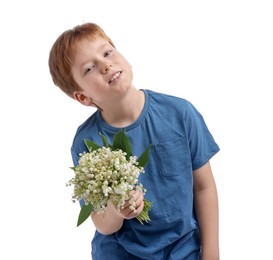 Photo of Boy with bouquet of beautiful lily-of-the-valley flowers on white background