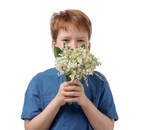 Photo of Boy with bouquet of beautiful lily-of-the-valley flowers on white background