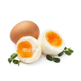 Photo of Soft boiled eggs with microgreens on white background