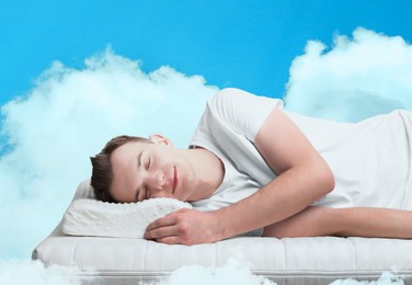 Image of Young man sleeping on comfortable mattress among clouds in blue sky