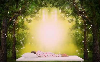 Image of Little girl sleeping on comfortable mattress in forest, back view