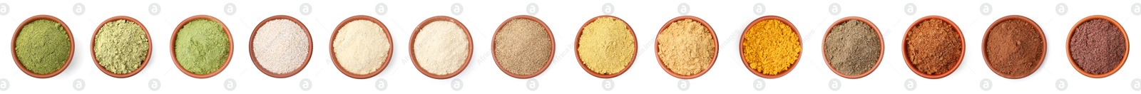 Different superfood powders in bowls on white background, set. Top view Image of Different superfood powders in bowls on white background, set. Top view