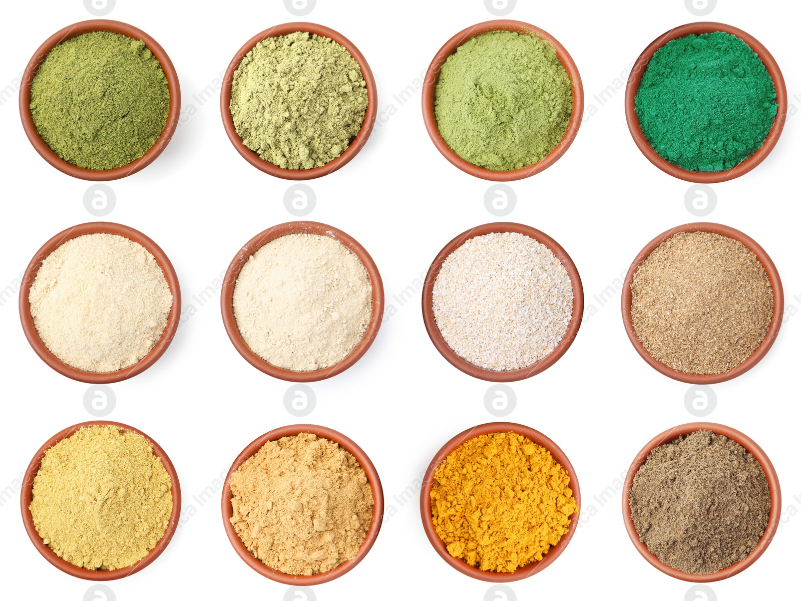 Different superfood powders in bowls on white background, set. Top view Image of Different superfood powders in bowls on white background, set. Top view