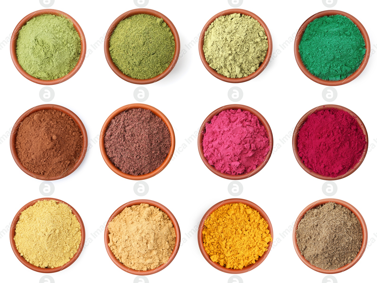 Different superfood powders in bowls on white background, set. Top view Image of Different superfood powders in bowls on white background, set. Top view
