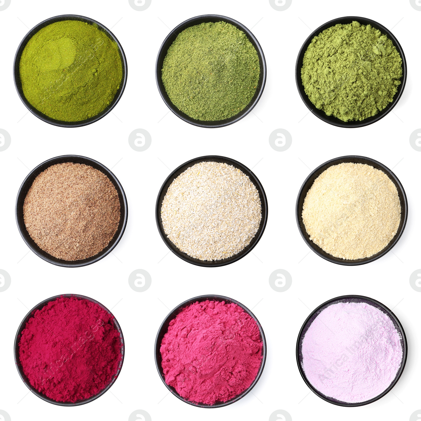 Different superfood powders in bowls on white background, set. Top view Image of Different superfood powders in bowls on white background, set. Top view