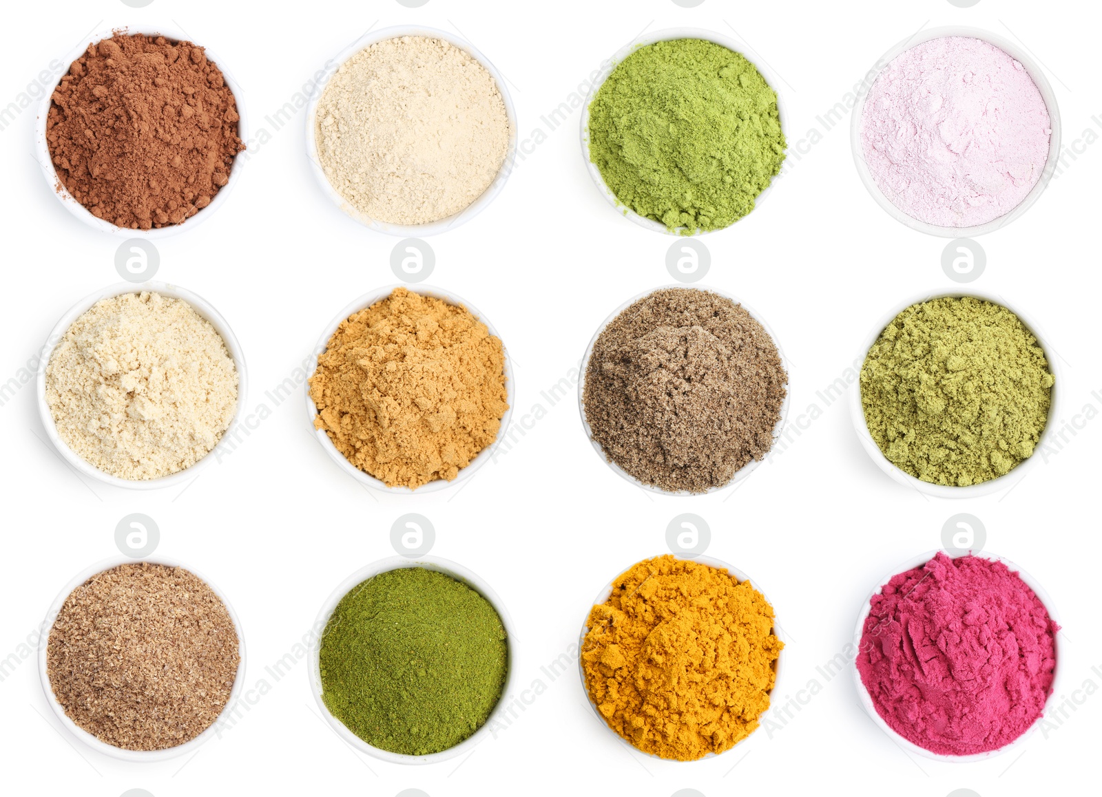 Different superfood powders in bowls on white background, set. Top view Image of Different superfood powders in bowls on white background, set. Top view