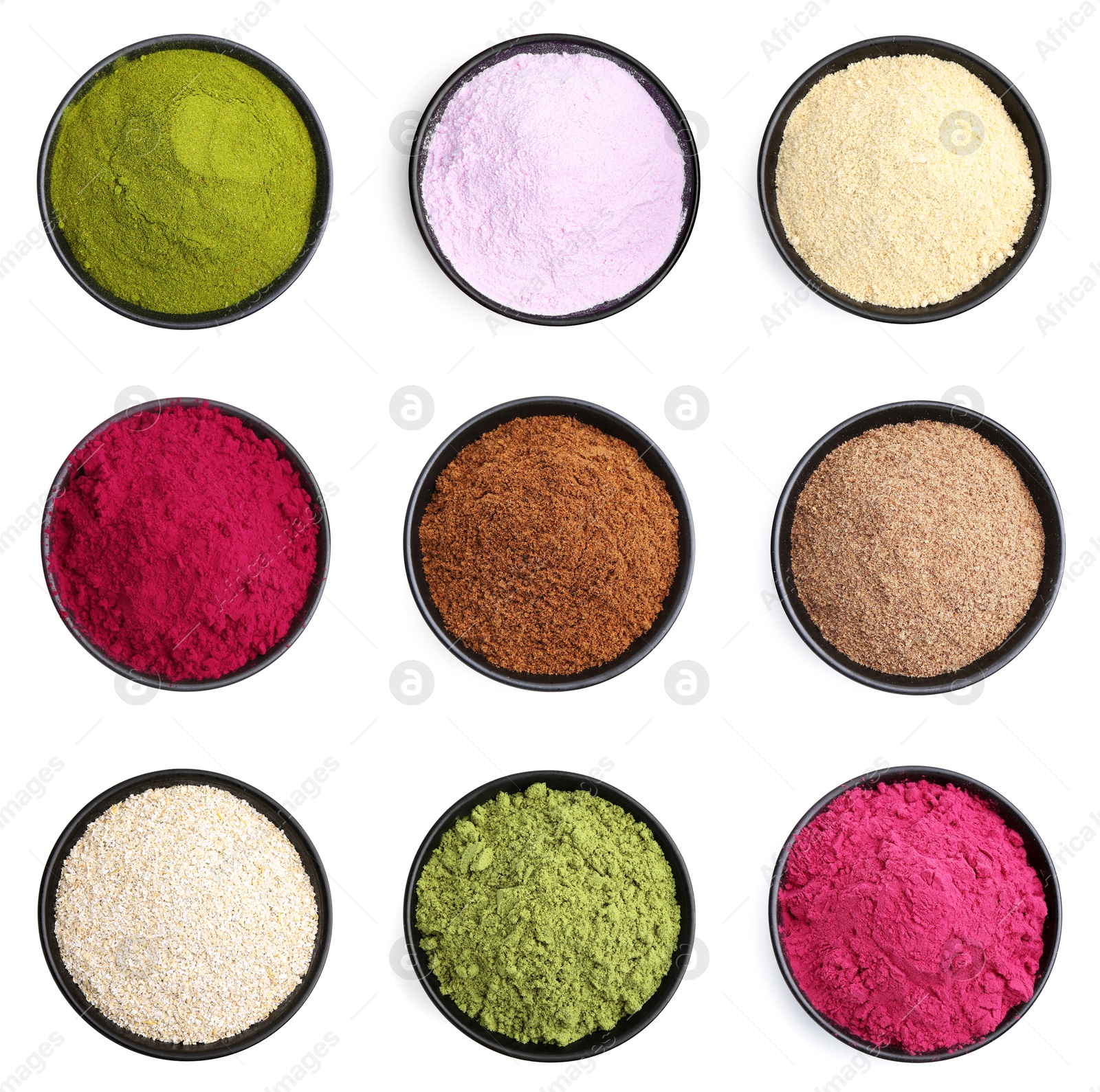 Different superfood powders in bowls on white background, set. Top view Image of Different superfood powders in bowls on white background, set. Top view
