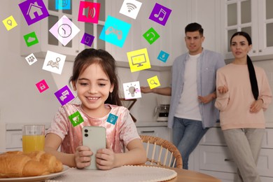 Image of Internet addiction. Parents unpleased with their daughter using mobile phone instead of eating breakfast in kitchen. Different icons flying out of device
