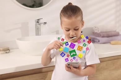 Image of Internet addicted child using mobile phone while brushing teeth in bathroom. Different icons flying out of device