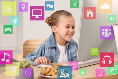 Image of Internet addicted child using computer at table. Different icons around her