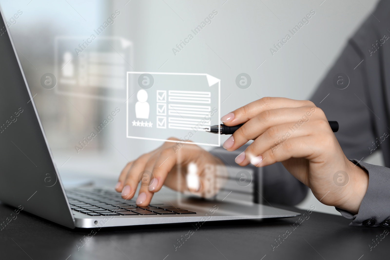 Recruitment, employee search. Human resources manager using laptop, closeup. Virtual resumes above computer Image of Recruitment, employee search. Human resources manager using laptop, closeup. Virtual resumes above computer