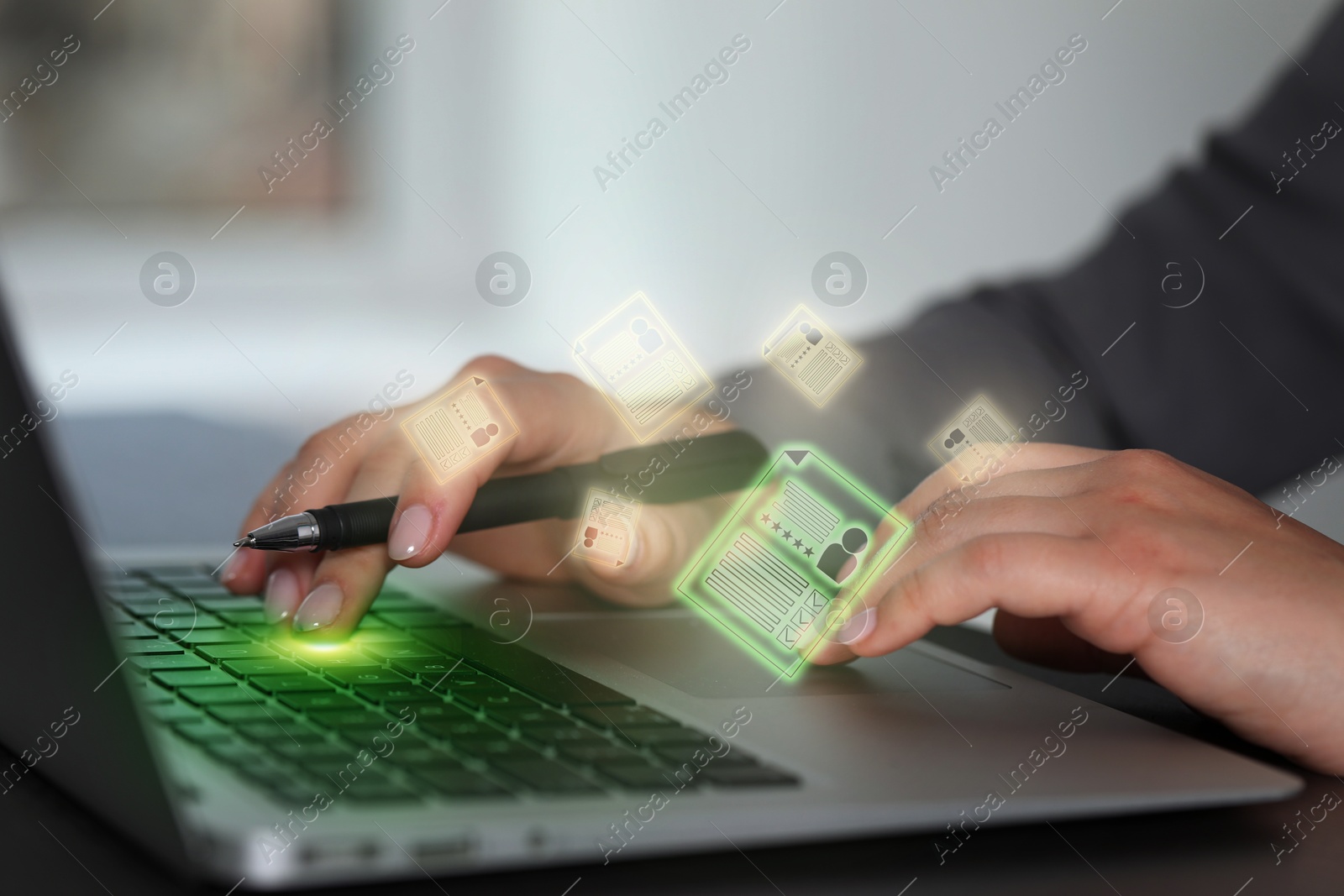 Recruitment, employee search. Human resources manager using laptop, closeup. Virtual resumes above computer Image of Recruitment, employee search. Human resources manager using laptop, closeup. Virtual resumes above computer