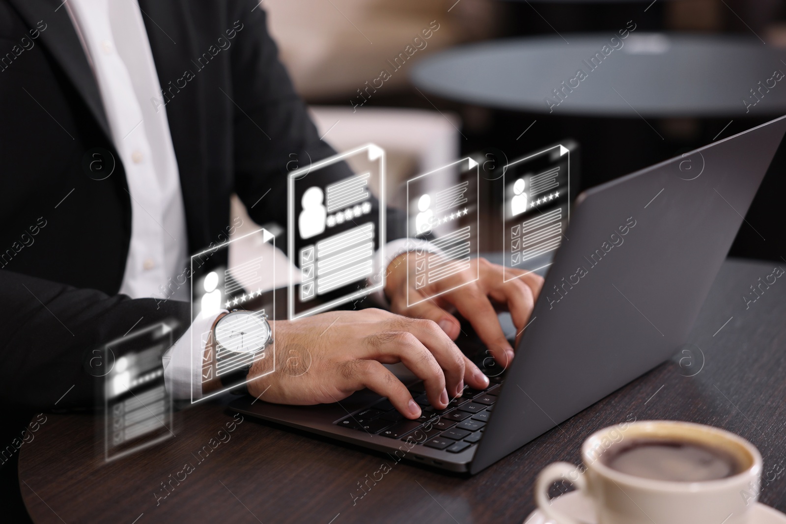 Recruitment, employee search. Human resources manager using laptop, closeup. Virtual resumes above computer Image of Recruitment, employee search. Human resources manager using laptop, closeup. Virtual resumes above computer