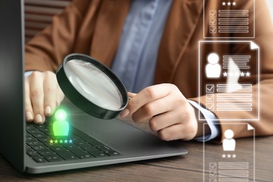 Image of Recruitment, employee search. Human resources manager with magnifying glass using laptop, closeup. Resumes on virtual screen