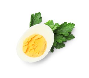 Photo of Boiled egg and parsley on white background, top view